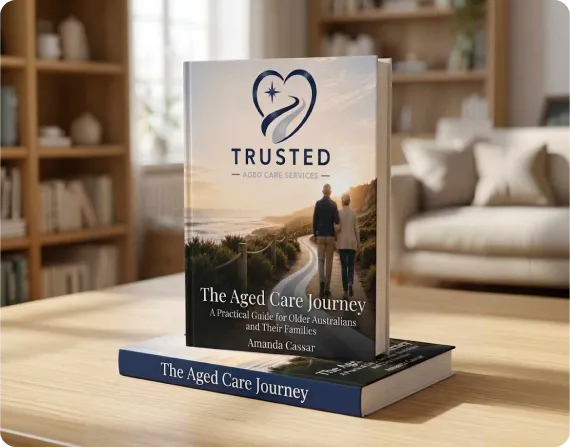 Cover of the book The Aged Care Journey on a wooden table in a living room